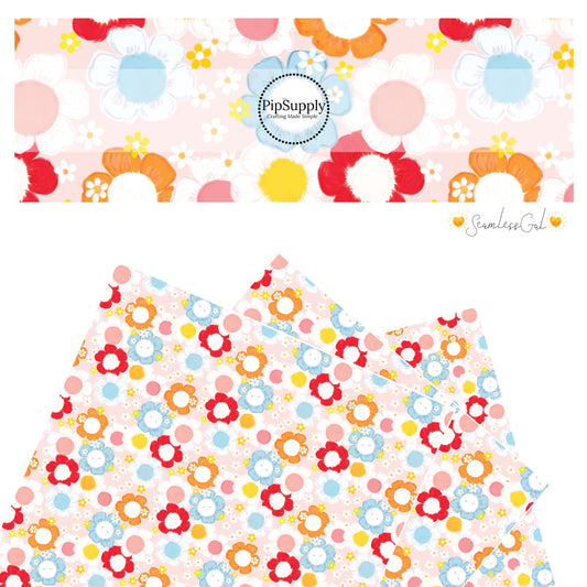 Pink, blue, orange, red, and yellow flowers on pink faux leather sheets