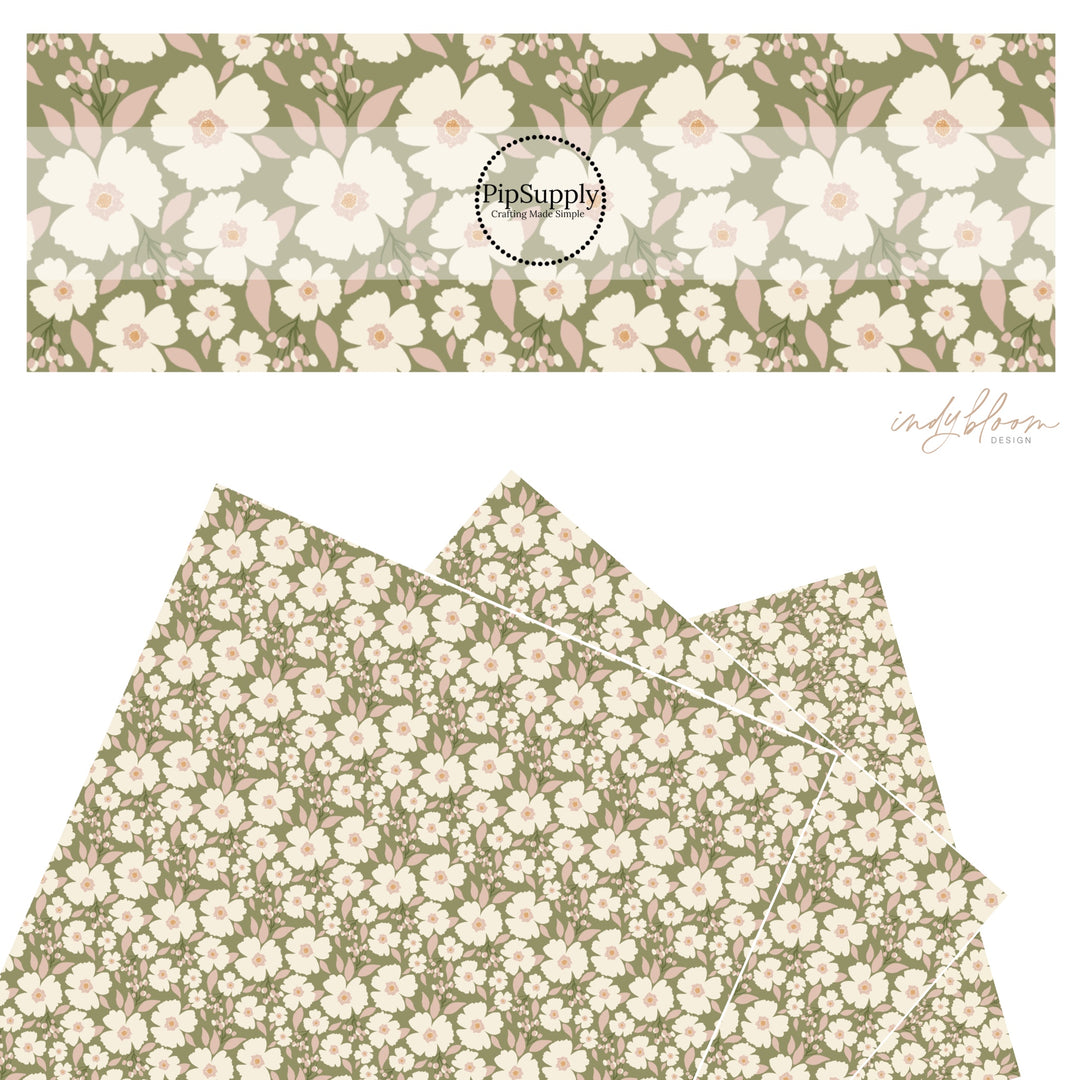 Cream flowers with peach leaves on green faux leather sheetgs