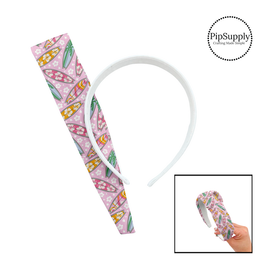Floral, palm trees, and groovy colorful surfboards on floral pink knotted headband 