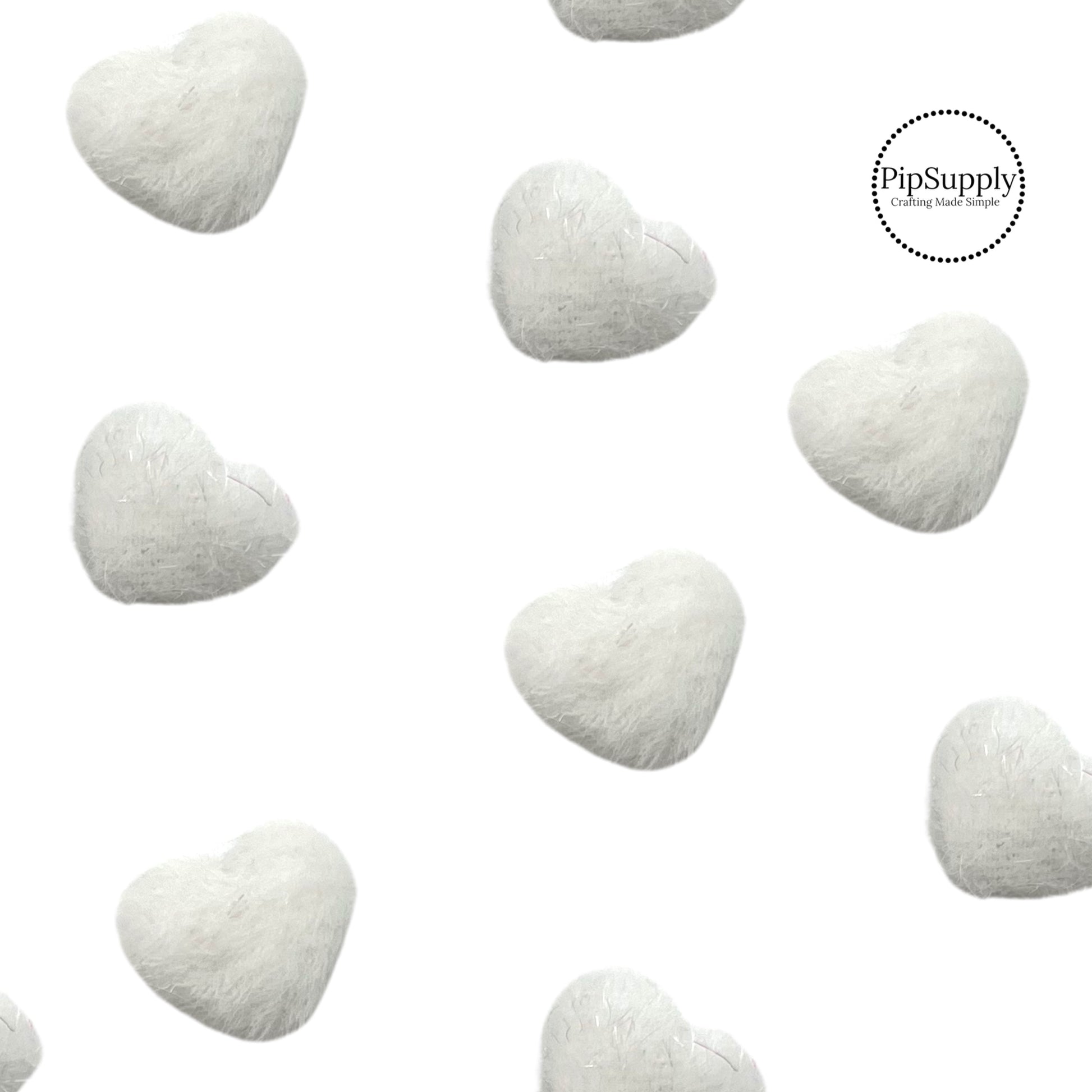 small flat backed white fuzzy hearts approximately 17mm wide for valentine crafts