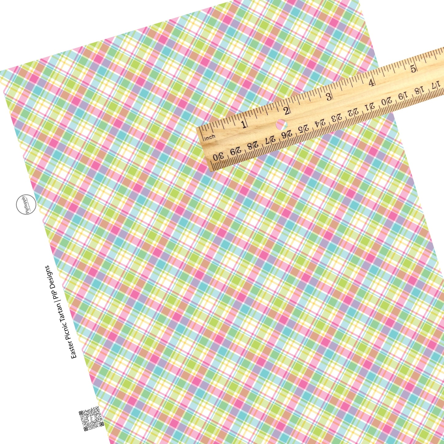 Green, pink, blue, and white diagonal criss cross tartan faux leather sheet