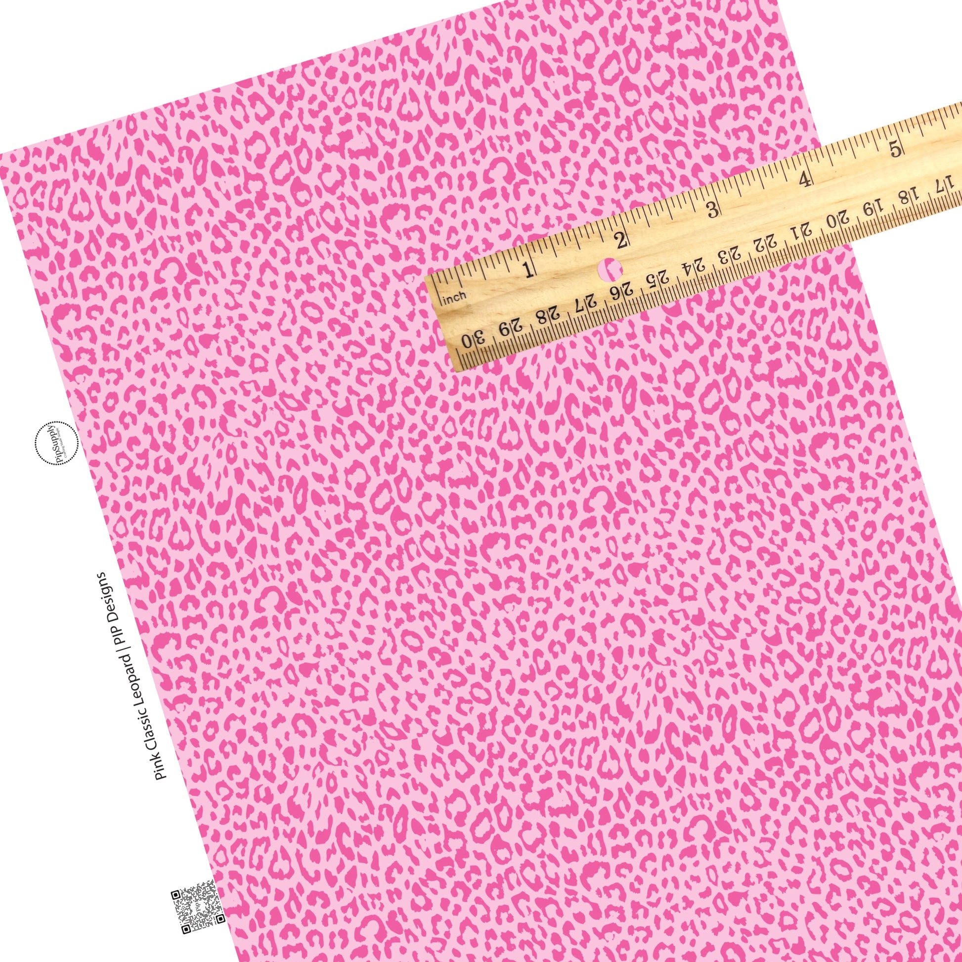 Scattered pink leopard spots on pink faux leather sheets