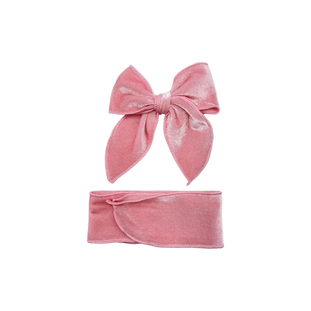 Tied and untied isabelle style velvet bow strip in ballerina pink.