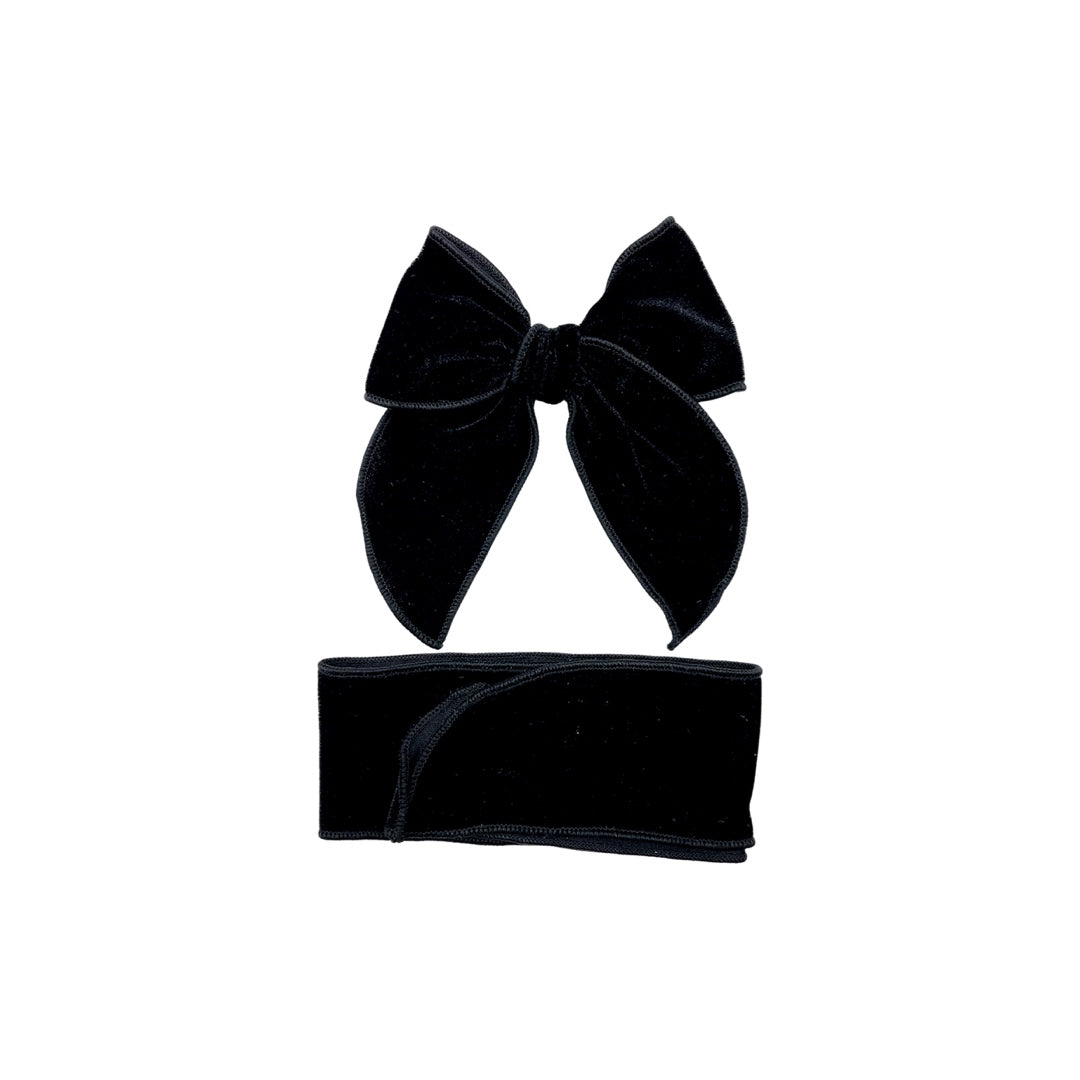 Tied and untied isabelle style velvet bow strip in black.