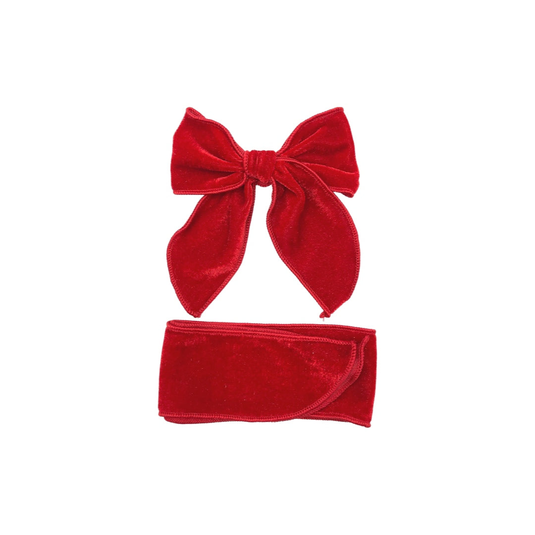 Red tied and untied isabelle style velvet bow strip.