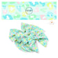 Neon pink, blue, green, and yellow leopard spots on mint bow strips