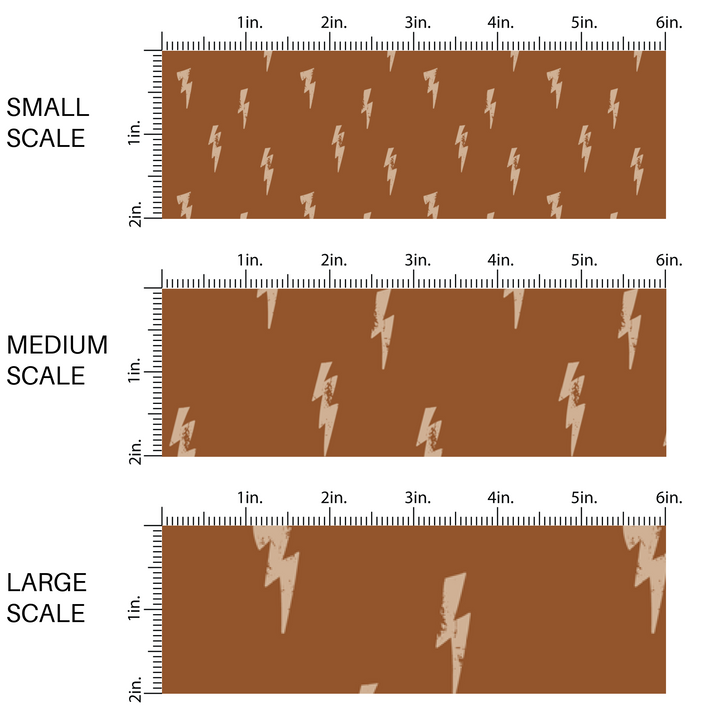 This image has three fabric scales of small, medium, and large scale for lightning bolts on brown. 