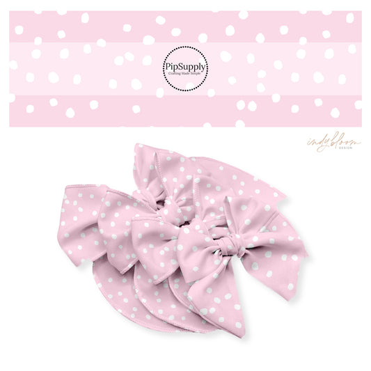 Tiny white dots on rose pink bow strips