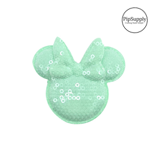Tiny iridescent sequins on light mint mouse head with bow embellishment