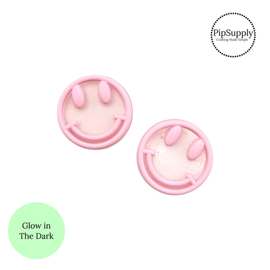 Clear glow in the dark smiley face light pink embellishment