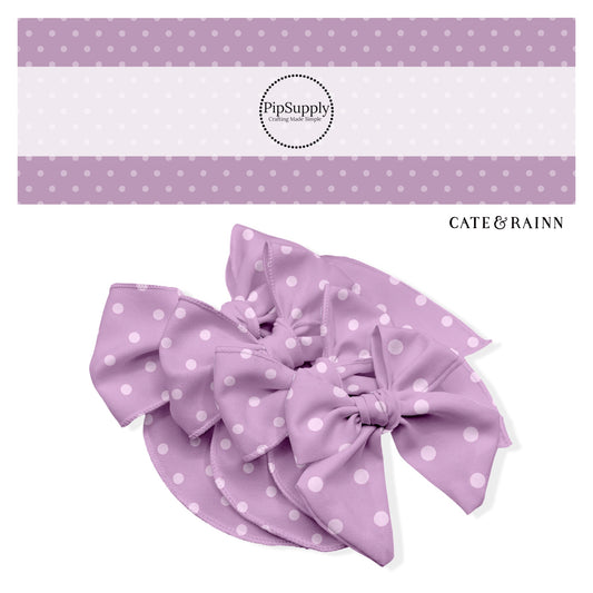 small light purple polka dots on darker purple bow strips