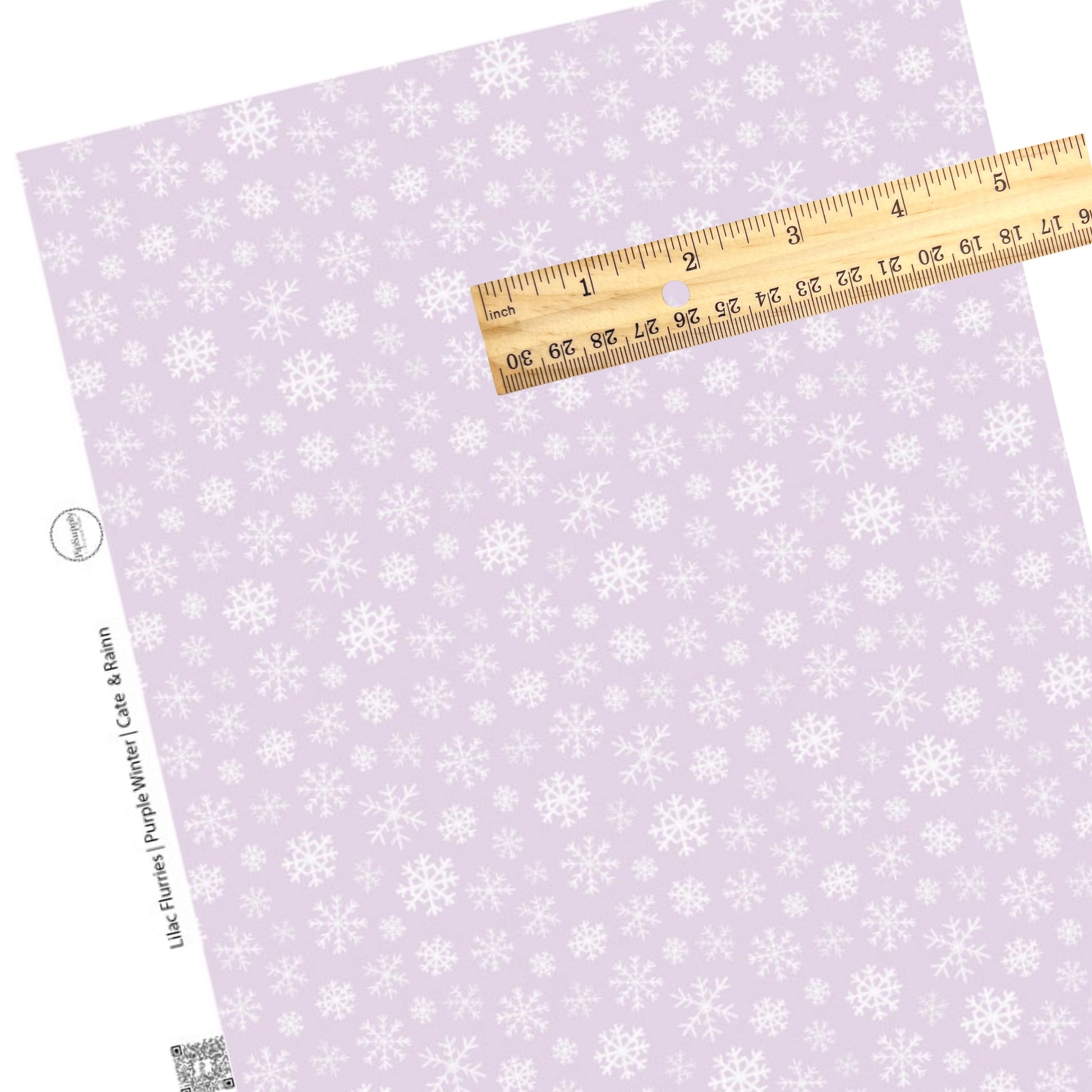 white multi sized snowflakes on lilac background faux leather sheet