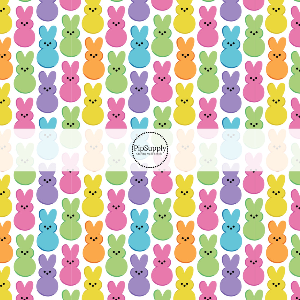 bright green, purple, yellow, orange, and pink bunnies on white bow strips