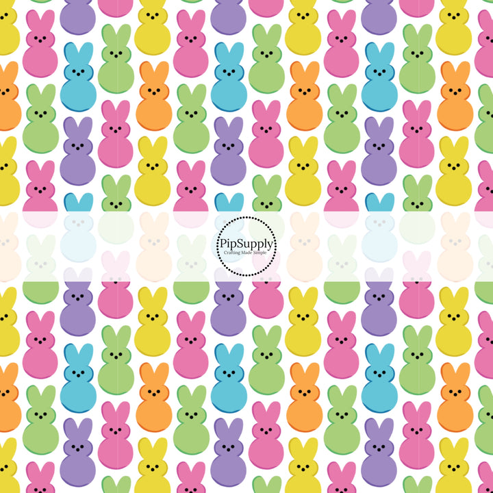 bright green, purple, yellow, orange, and pink bunnies on white bow strips