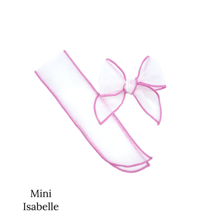 mini isabelle with purple stitching on white sheer bow strips