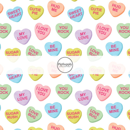 multi pastel candy hearts with words on them on white no sew bow strips