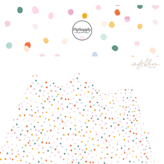 Multi pink, blue, green, and peach dots on white faux leather sheets
