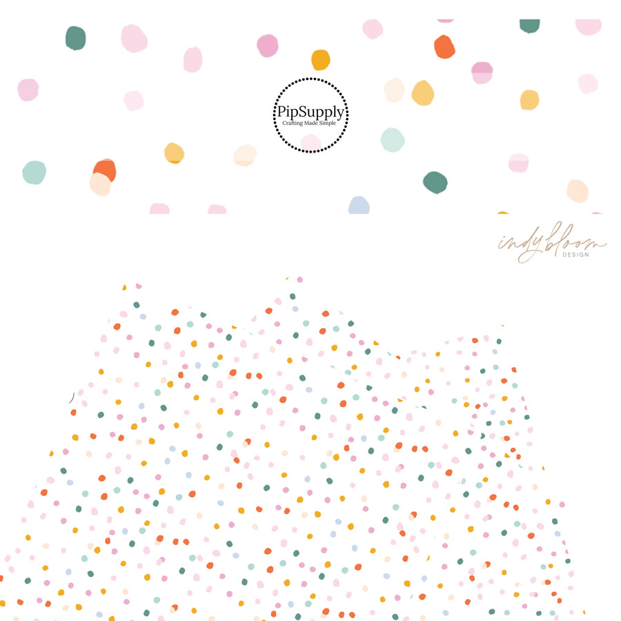 Multi pink, blue, green, and peach dots on white faux leather sheets