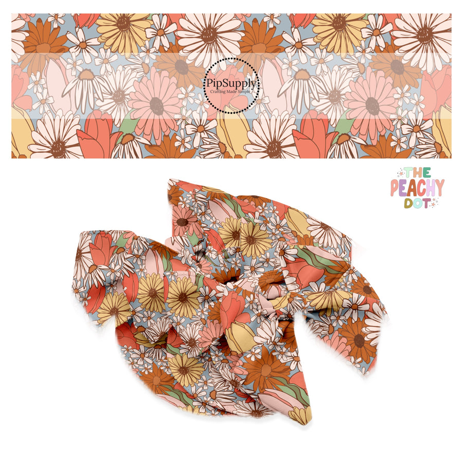 Yellow, cream, peach, and rust floral on blue bow strips