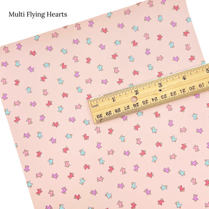 wild daisy mini flying hearts on light pink faux leather sheet