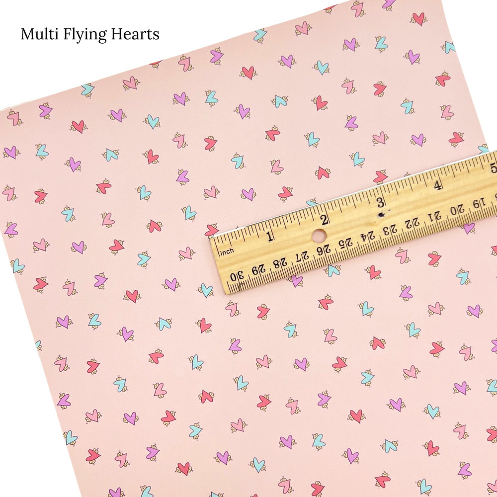 wild daisy mini flying hearts on light pink faux leather sheet