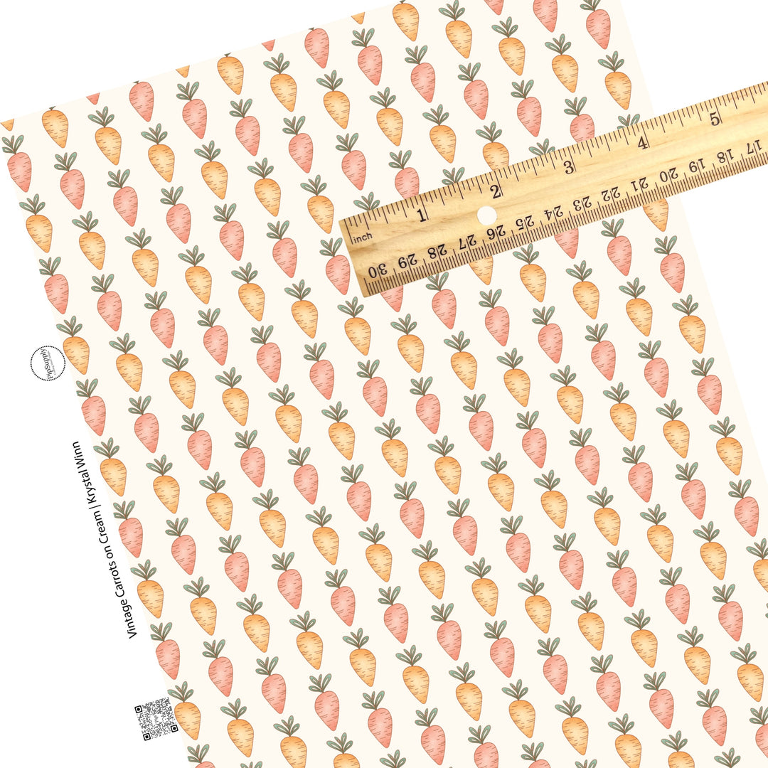 rows of orange and peach carrots on cream faux leather sheets