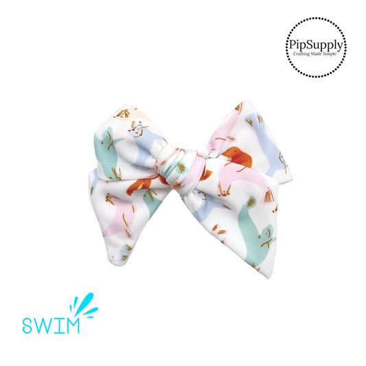Playful pastel multi seals on white swimsuit bow strips