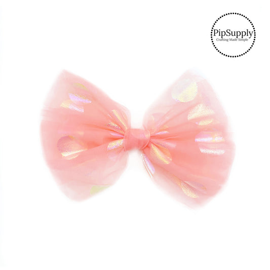peach bow with iridescent polka dots bow