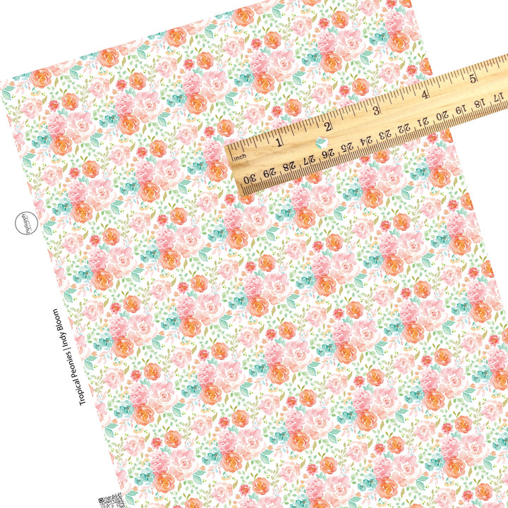 Patches of blue, peach, and pink flowers on white faux leather sheets