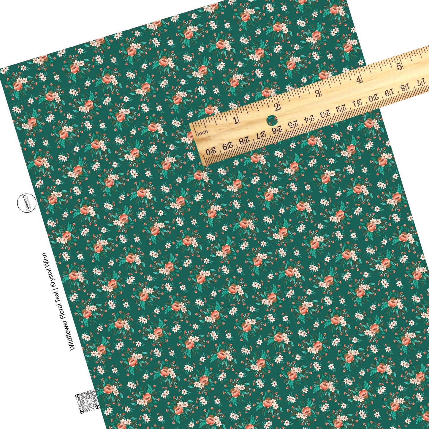cream flowers with peach flowers on teal faux leather sheets