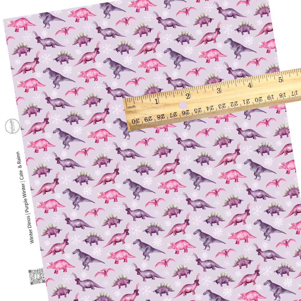 light purple and white snowflake faux leather sheet with purple and pink dinos