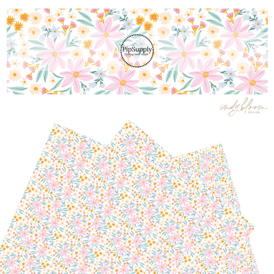 Pink, orange, peach, and blue flowers on pearl faux leather sheets