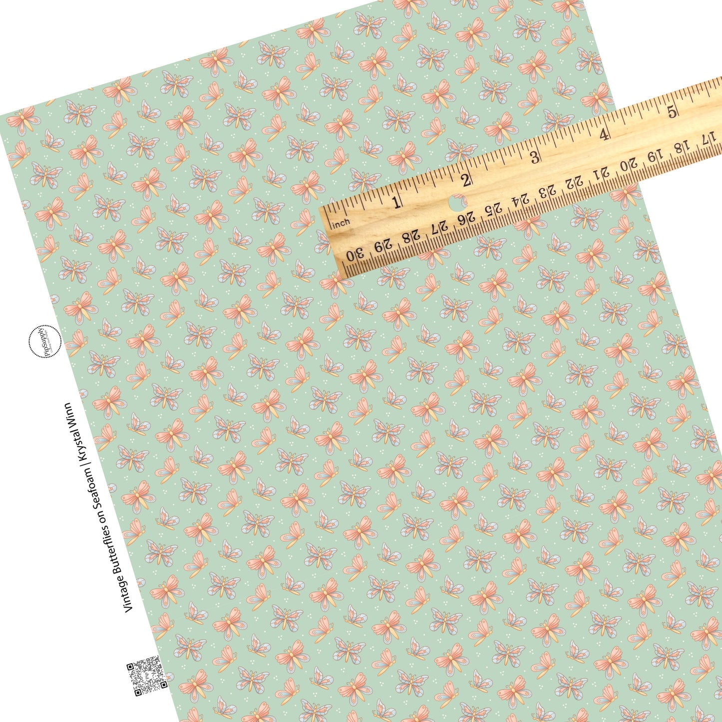 polka dots and butterflies on seafoam faux leather sheets