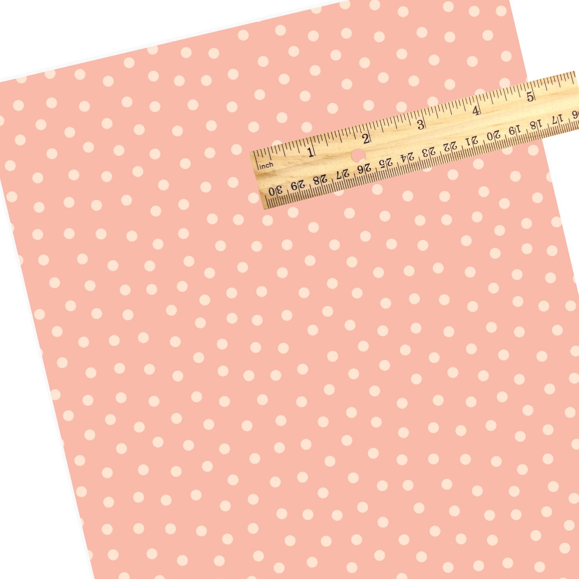 pink dots on pink faux leather sheets