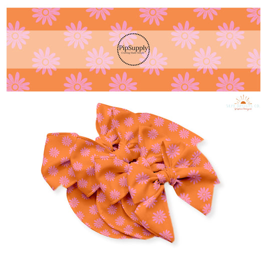 Pink flowers on orange bow strips