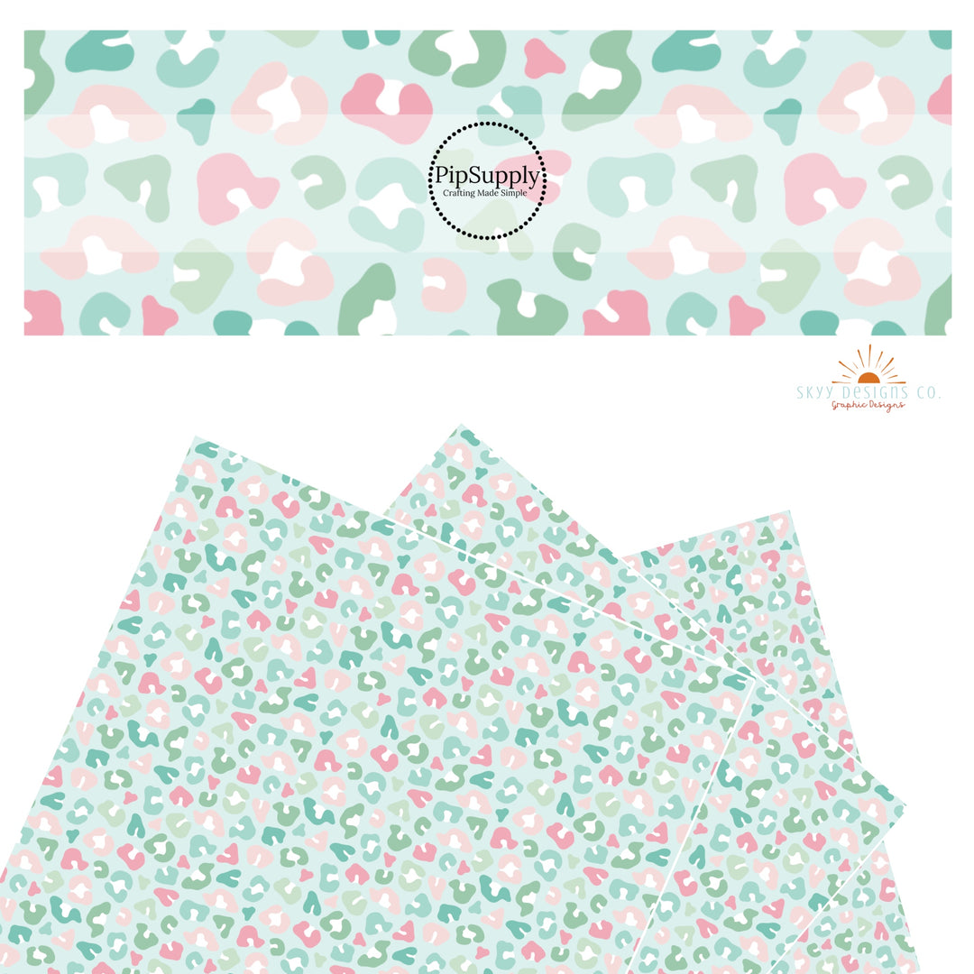 Pink, mint, and green leopard spots on mint faux leather sheets