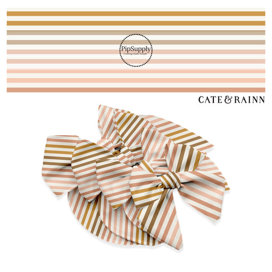 brown, mustard, pink, and peach stripes on cream bow strips