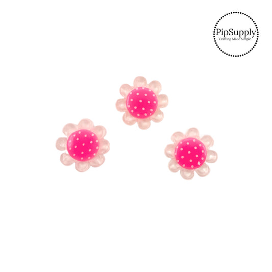 White flower with pink polka dot center resin embellishment