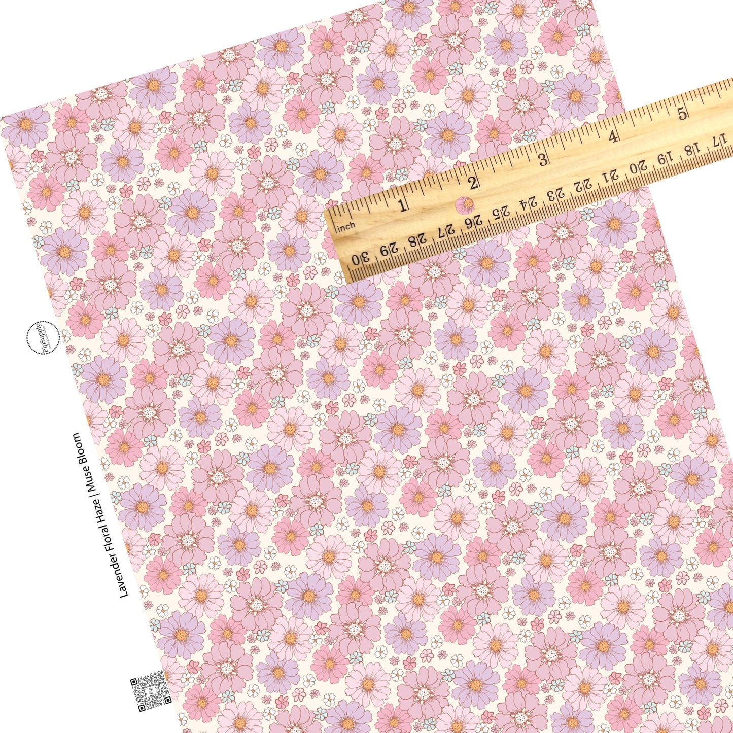 Big lavender and pink flowers with tiny pink, purple, white, and aqua floral on cream faux leather sheets