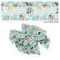 puppies and floral on aqua bow strips
