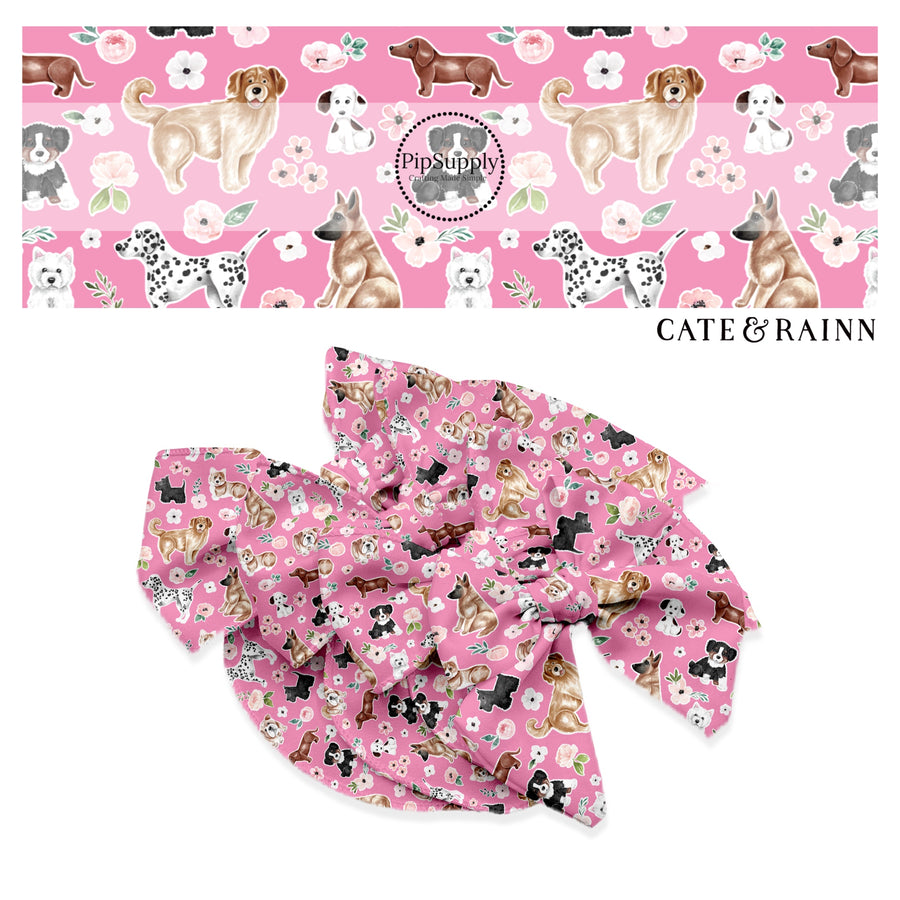 brown, white, black, and dalmatian puppies with flowers on pink bow strips