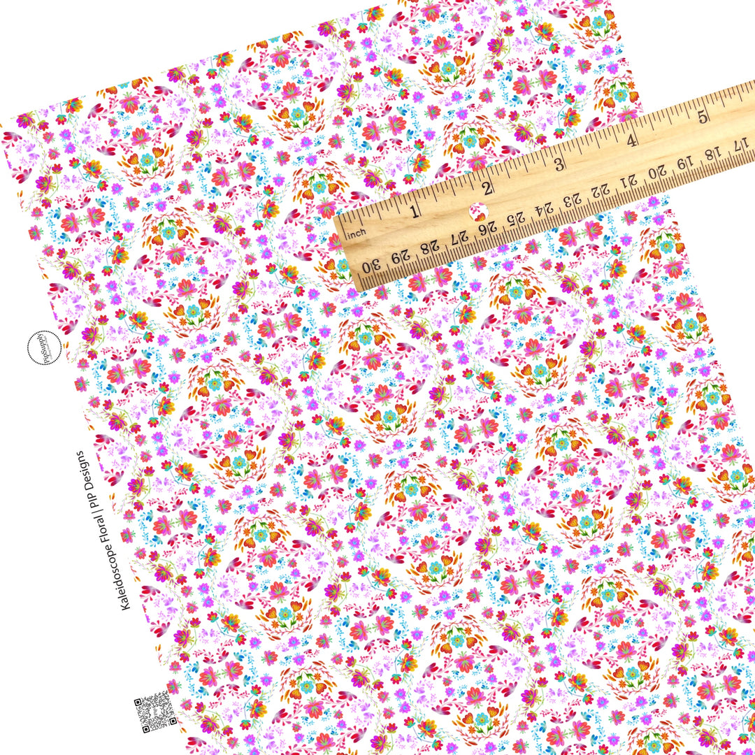 Bright kaleidoscope floral on white faux leather sheets