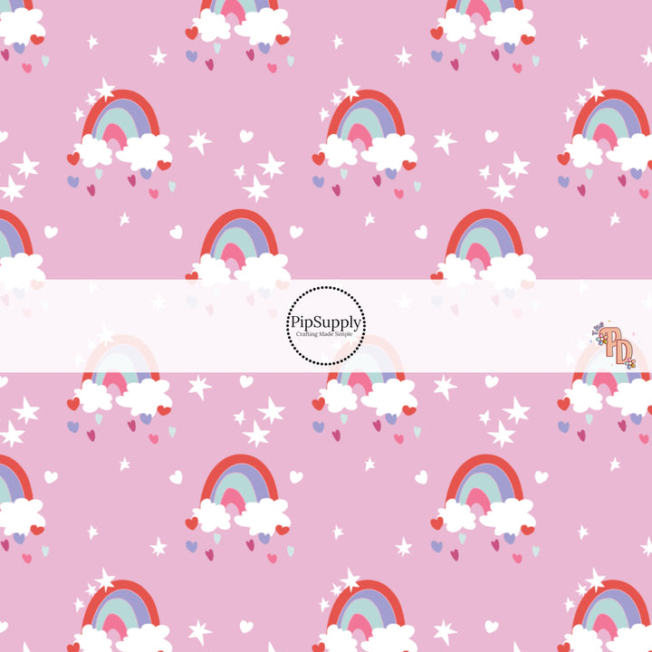 Bright colorful rainbow and clouds on pink background bow strip. 