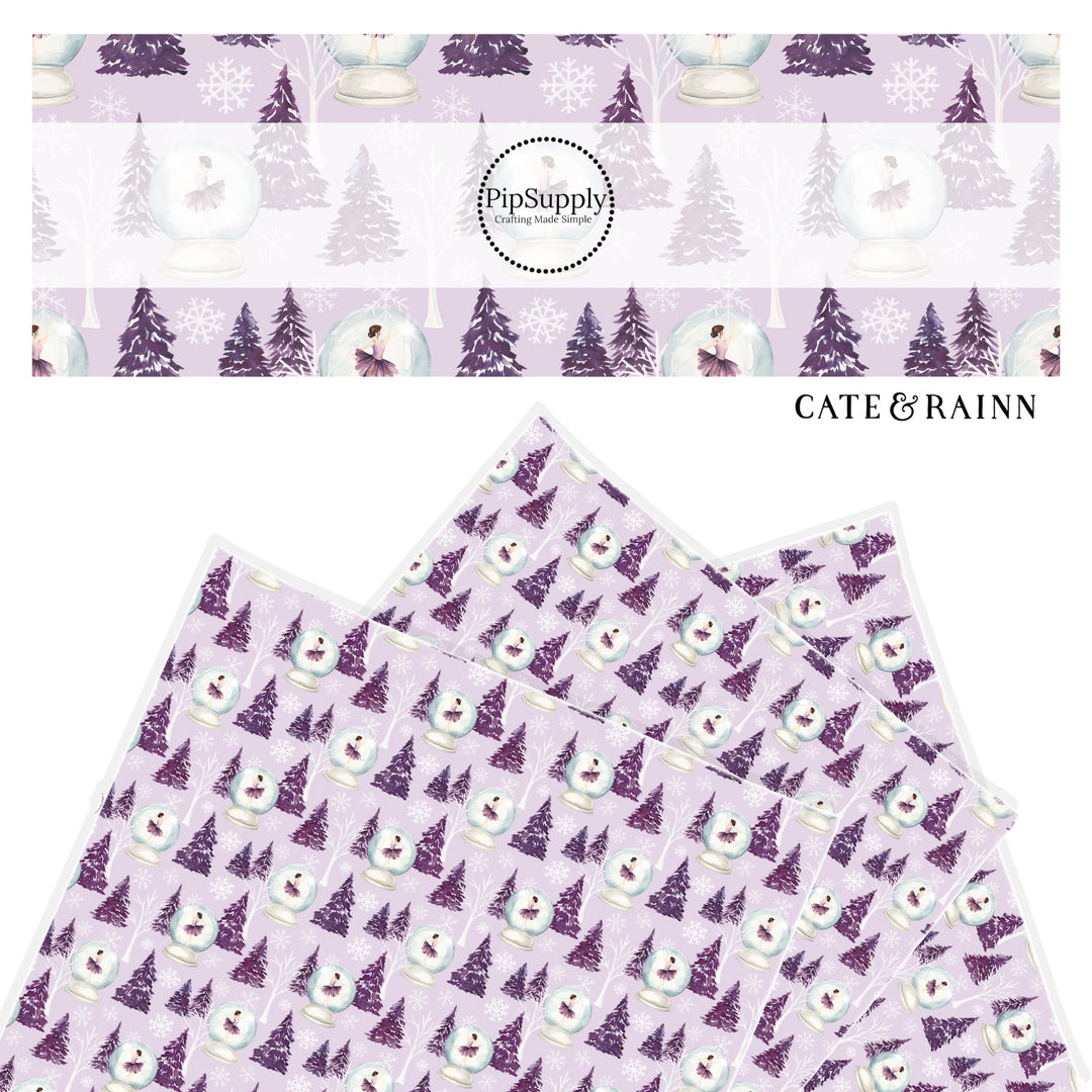 light purple faux leather sheet with snow capped purple trees, white snowflakes and a ballerina in a snow globe