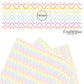 Thin rainbow wavy lines on white faux leather sheets