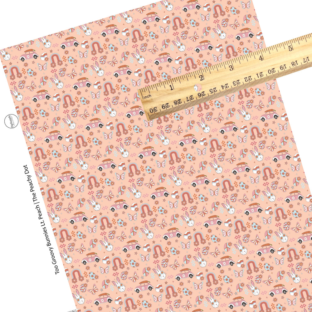 Checker, bunnies, rainbows, flowers, cars, eggs, and butterflies on peach faux leather sheets