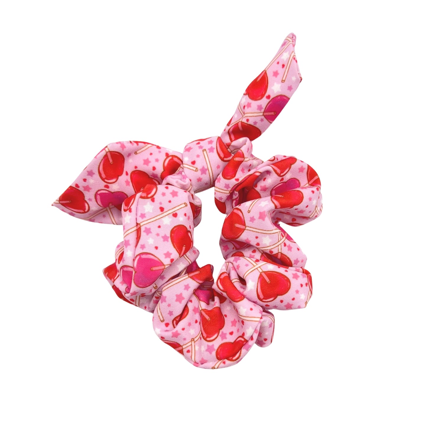 pink and red heart lollipops with pink and white stars on pink scrunchie
