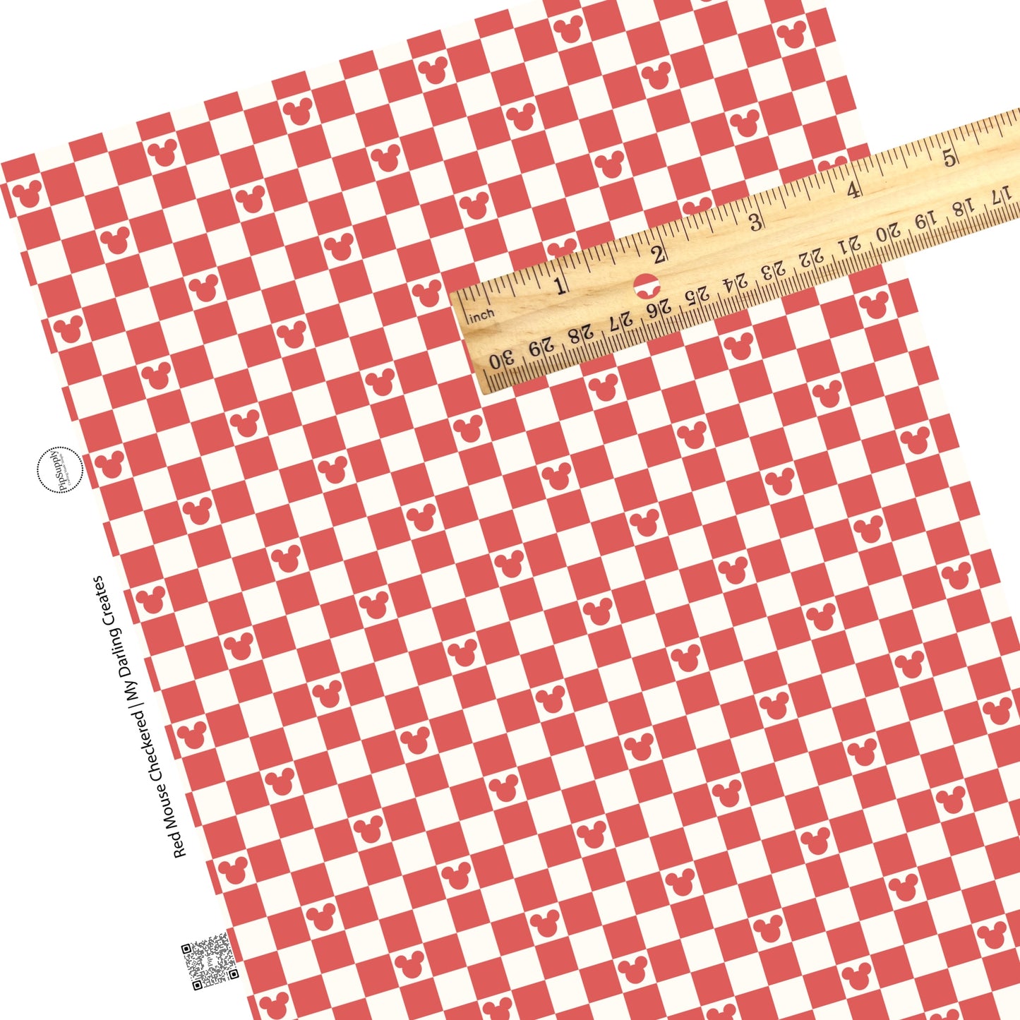 Red mouse head and tiles on cream checker faux leather sheets