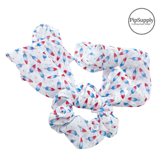 Red white and blue rocket popsicles with stars on white scarf scrunchie