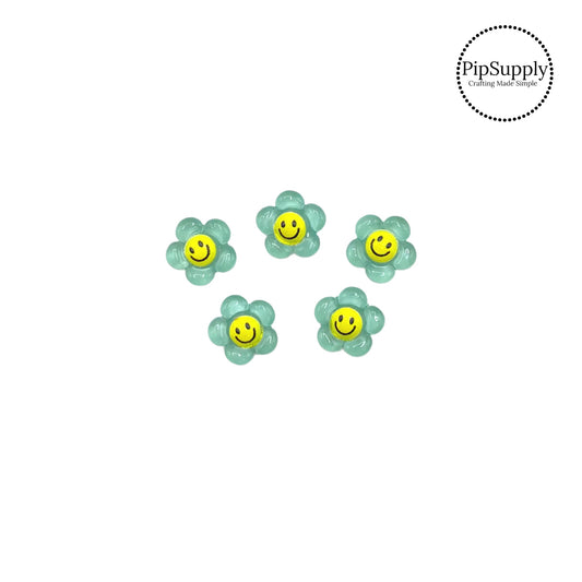 Seafoam daisy with yellow smiley face embellishment